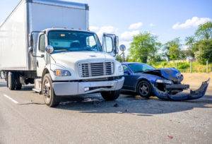 commercial truck and passenger vehicle wreck