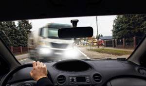 driver swerving away from commercial truck