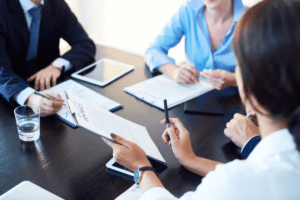 Lawyers helping a client with a personal injury claim