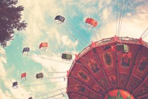 empty swing ride in amusement park