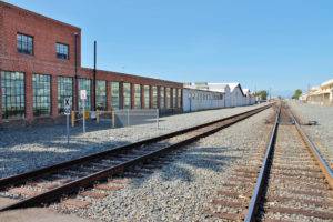 empty rail tracks in industrial yard