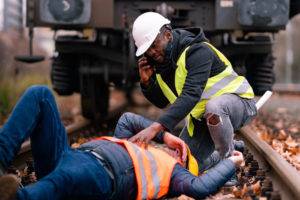 injured rail worker receiving assistance