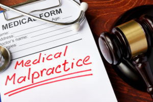 medical malpractice form stethoscope and gavel