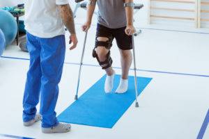 a-delivery-truck-accident-victim-rehabbing-their-leg-with-a-physical-therapist